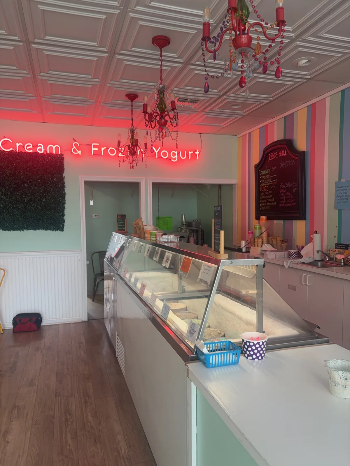 Refrigerated ice cream display and serving counter inside Wally’s in Auburndale.