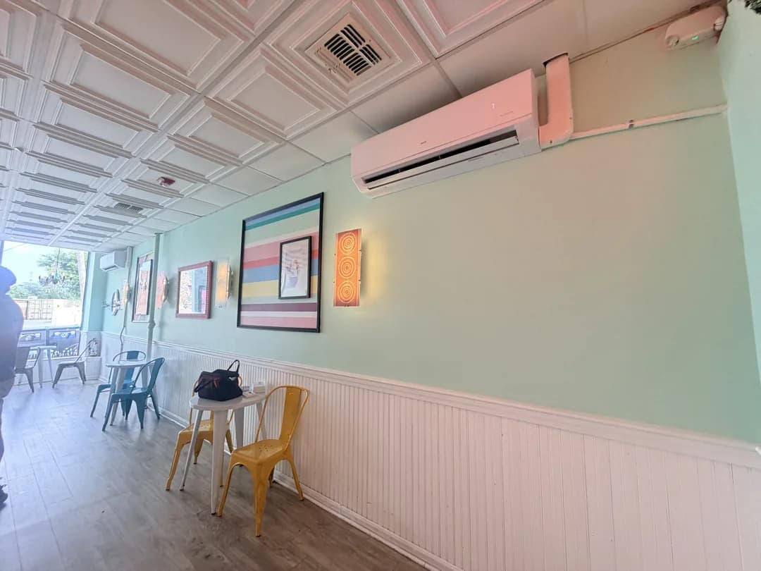 Completed wall-mounted heat pumps along the seating area at Wally’s ice cream shop in Auburndale, Newton.