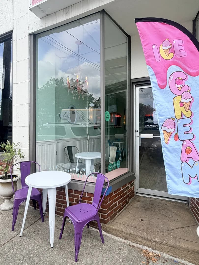 Ice cream flag and outdoor tables outside Wally’s in Newton’s Auburndale village.